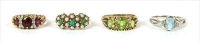 Lot 58 - A 9ct gold ruby and diamond ring