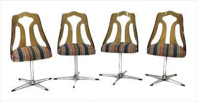 Lot 540 - A set of four revolving chairs