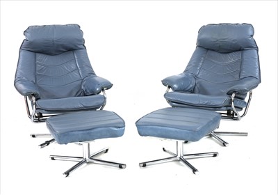 Lot 584 - A pair of lounge chairs and ottomans