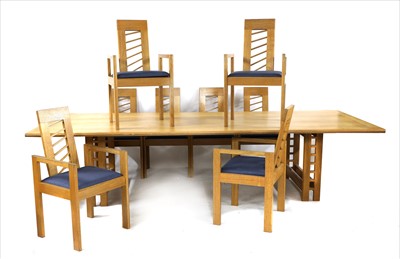 Lot 457 - A Miles Carter oak dining suite