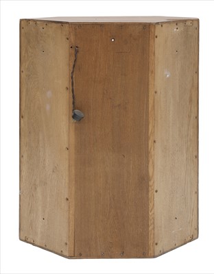 Lot 232 - An oak hanging corner cupboard
