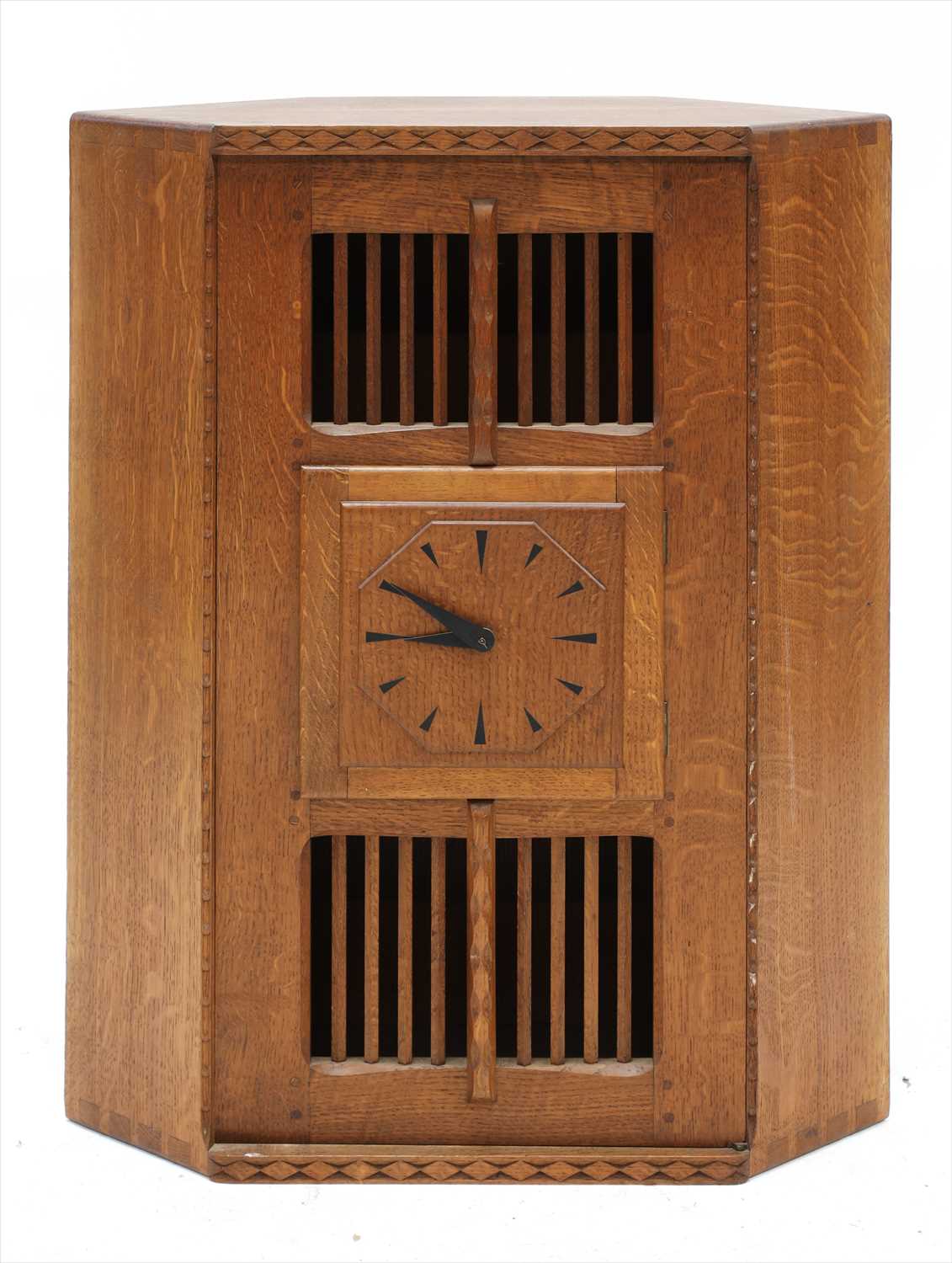 Lot 232 - An oak hanging corner cupboard