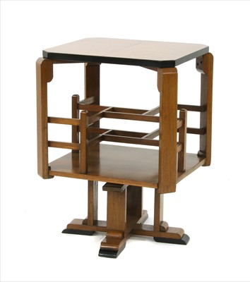 Lot 184 - An Art Deco walnut revolving book table