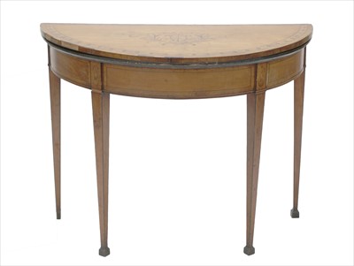 Lot 601 - A George III inlaid satinwood demilune fold-over card table