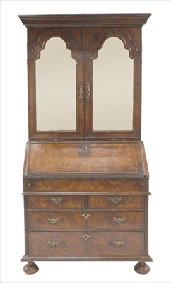 Lot 613 - A walnut bureau bookcase