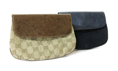 Lot 1002 - Two vintage Gucci clutch
