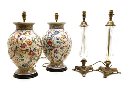 Lot 219 - A pair of brass and glass table lamps