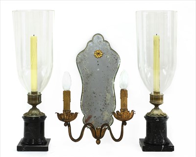Lot 964 - A pair of black marble storm lanterns