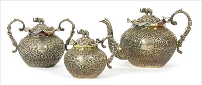 Lot 135 - An Indian three piece silver tea service