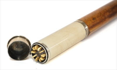 Lot 192 - An ivory and metal butt marker walking stick