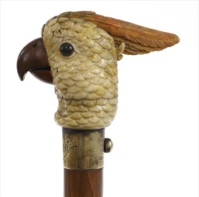 Lot 184 - A rare carved and painted ivory cockatoo automaton walking stick