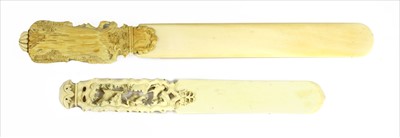 Lot 142 - Two carved ivory letter openers