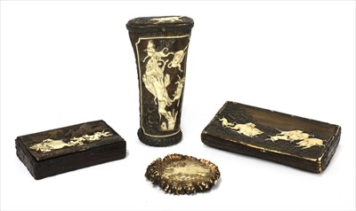 Lot 133 - Four carved antler boar hunting items