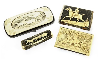 Lot 134 - Four carved ivory and antler hunting-related items