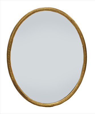 Lot 745 - A carved giltwood oval mirror