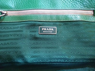 Lot 53 - A Prada green leather shoulder bag