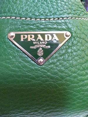 Lot 53 - A Prada green leather shoulder bag
