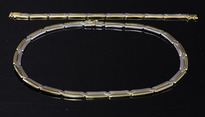 Lot 185 - An 18ct two colour gold necklace and bracelet suite