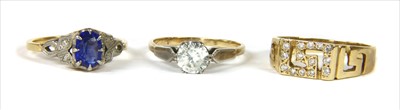 Lot 17 - A gold single stone cubic zirconia ring