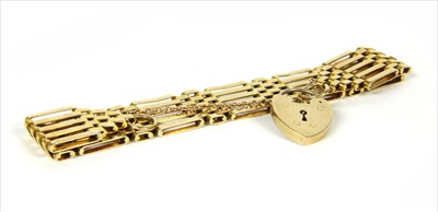 Lot 10 - A 9ct gold five row gate bracelet