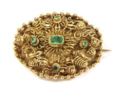 Lot 9 - A gold emerald oval cannetille brooch