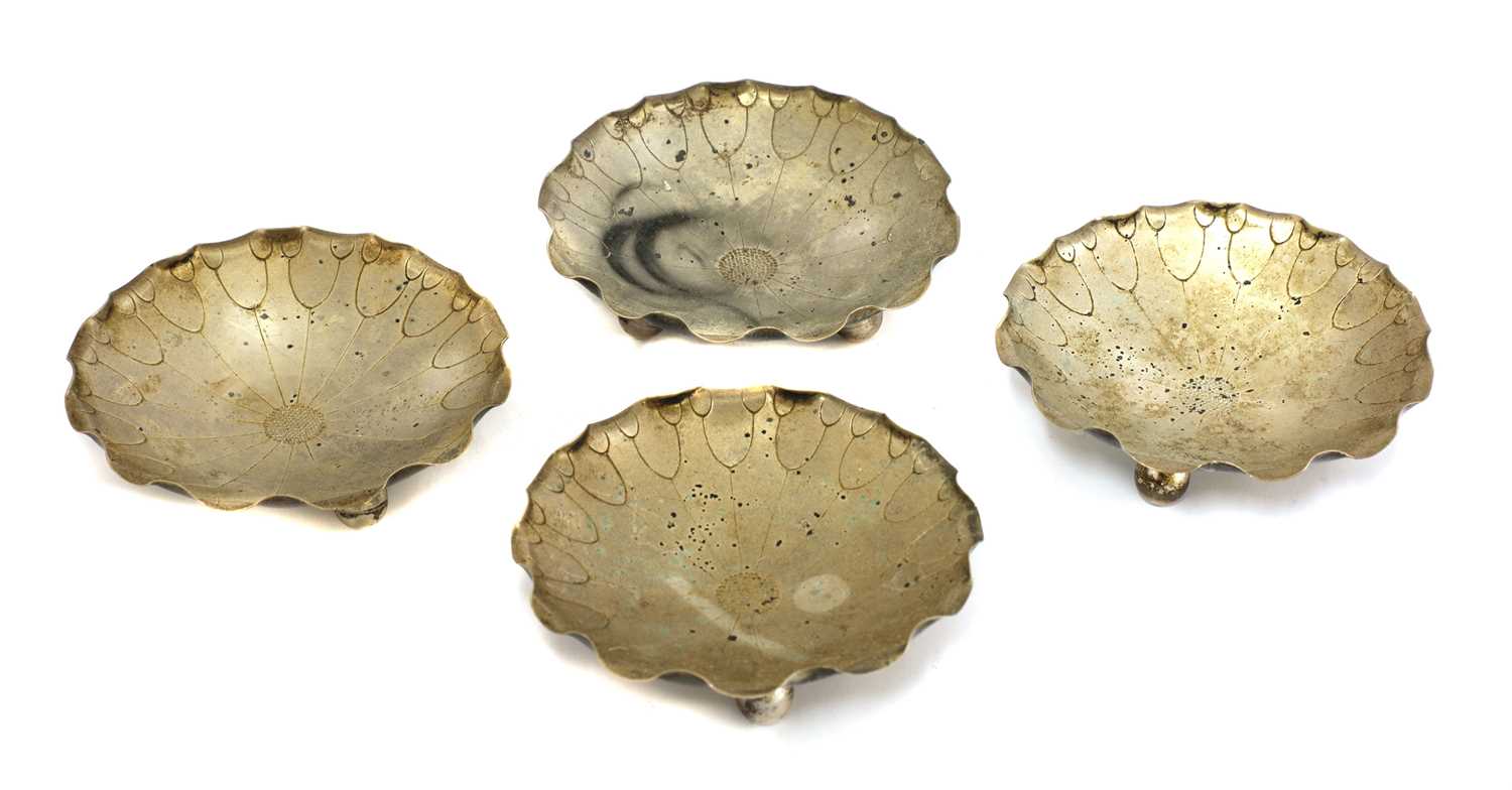Lot 186 - A set of four Chinese white metal dishes