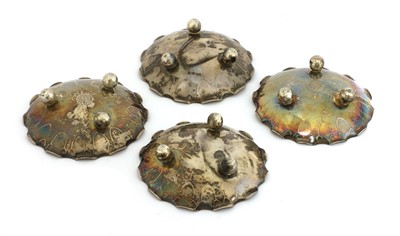 Lot 186 - A set of four Chinese white metal dishes
