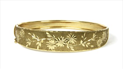 Lot 46 - A 9ct gold hinged bangle