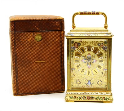 Lot 208 - A champlevé enamel carriage clock
