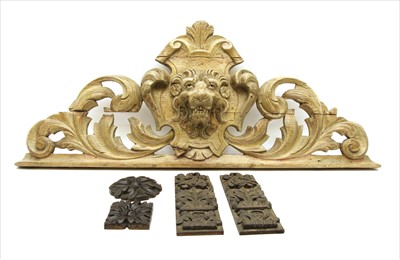 Lot 215 - A carved pine overdoor