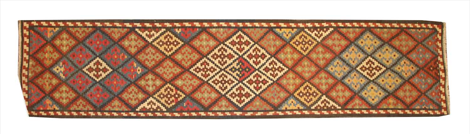 Lot 640 - A Persian Varamin kilim runner