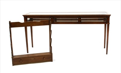 Lot 442 - A glazed bijouterie table on square tapering legs