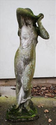 Lot 469 - A composition concrete garden statue
