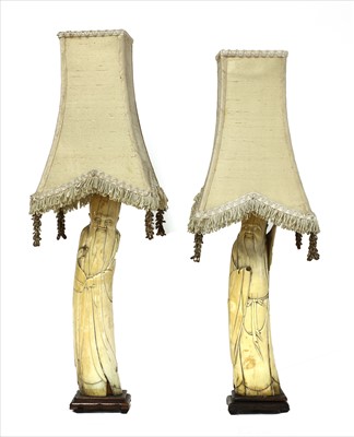 Lot 161 - A pair of Chinese ivory tusk figures