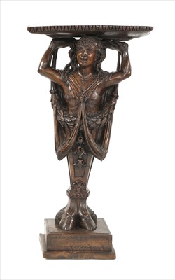 Lot 676 - A Continental walnut pedestal