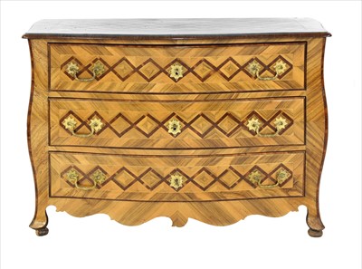 Lot 916 - A German walnut and bombé commode
