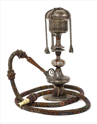Lot 188 - A fine Persian white metal and turned wood water pipe