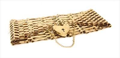 Lot 26 - A 9ct gold ten row gate bracelet