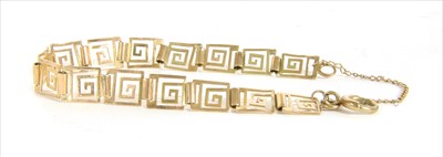 Lot 28 - A gold Greek key design bracelet