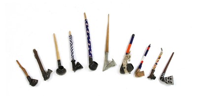 Lot 213 - Ten African pipes
