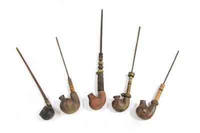 Lot 212 - Five African clay pipes