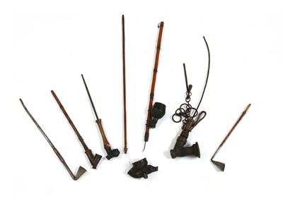Lot 210 - Seven African pipes