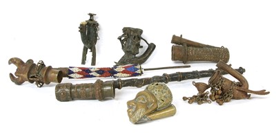 Lot 207 - Seven West African brass and copper pipe bowls