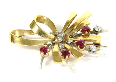 Lot 46 - A gold ruby and diamond spray brooch