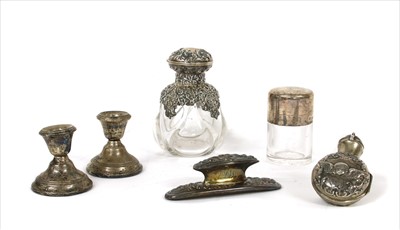 Lot 69 - A silver mounted scent bottle