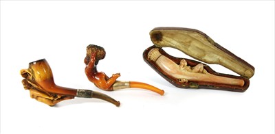 Lot 166 - Three erotic meerschaum pipes
