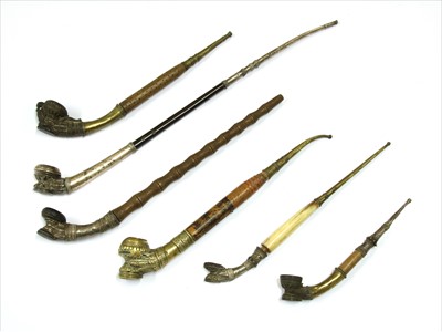 Lot 4 - Six Burmese clay-mounted pipes