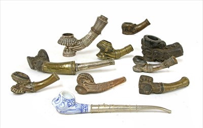 Lot 2 - Nine Burmese clay or metal pipe bowls