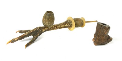 Lot 220 - An Australian claw pipe