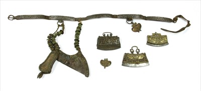 Lot 12 - Three Tibetan leather tinder pouches or chuckmucks